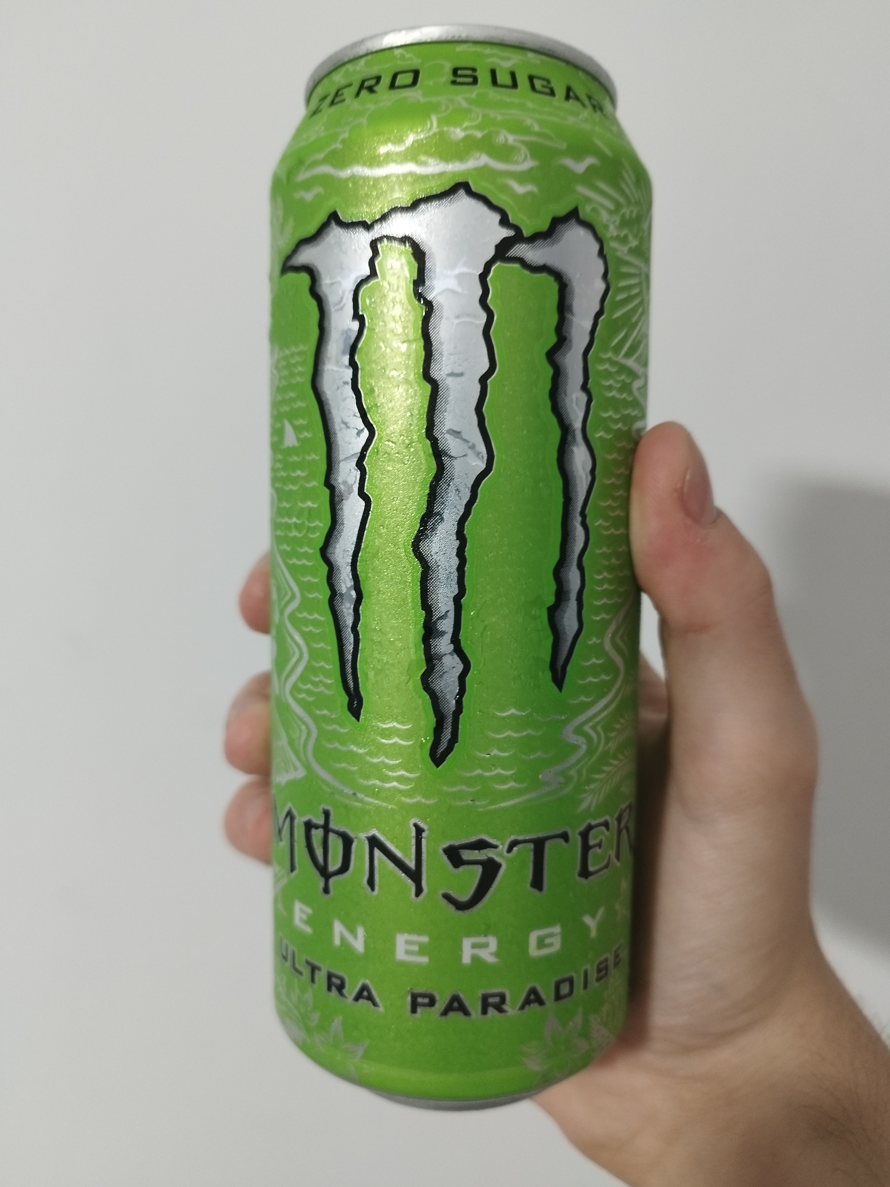 a green can of monster energy ultra paradise
